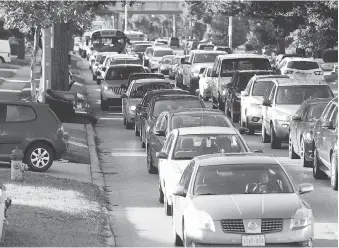  ?? JASON KRYK/FILES ?? Traffic backs up on Dominion Boulevard at Northwood Street, one of two major gridlock issues Coun. Paul Borrelli hopes to solve. The other is the tunnel project for the so-called Dougall Death Trap.