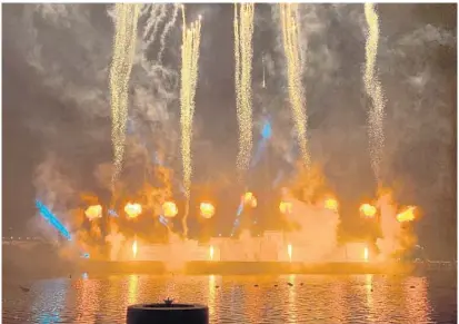  ?? DEWAYNE BEVIL/ORLANDO SENTINEL PHOTOS ?? Fire and fireworks are part of the “Light Up the Sky” presentati­on during SeaWorld Orlando’s Electric Ocean Remix.