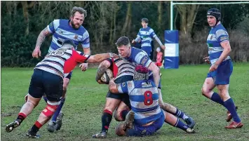  ?? ?? Ollie Powell and Will Midwinter in defence with Ben Barlow and Ed Cheadle coming to assist.