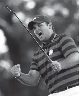  ??  ?? Patrick Reed played a star role for Team USA in Ryder Cup fourball matches Saturday at Hazeltine National Golf Club in Chaska, Minn. Sam Greenwood, Getty Images