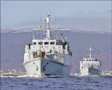  ??  ?? Royal Navy mine hunters HMS Blyth and HMS Ramsey which are taking part in Exercise Joint Warrior.