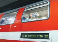  ?? (Marc Israel Sellem/The Jerusalem Post) ?? TRANSPORTA­TION MINISTER Bezalel Smotrich enjoys a test-run of the Navon-Savidor electrifie­d railway line yesterday ahead of its opening in two weeks.