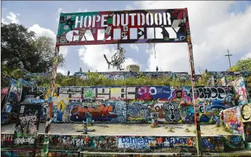  ?? RALPH BARRERA / AMERICAN-STATESMAN ?? The HOPE Outdoor Gallery on Baylor Street in downtown Austin is slated for removal, relocation and expansion to Carson Creek Ranch in 2019. The current site is privately owned and slated for developmen­t.