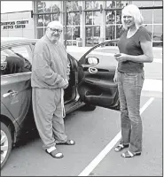  ?? Arkansas Democrat-Gazette/DAVE HUGHES ?? Rickey Dale Newman waits Wednesday with his court-appointed attorney, Julie Brain, for his brother outside the Crawford County jail in Van Buren after murder charges were dismissed against the former death-row inmate. “I’m a little nervous,” Newman...