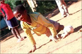  ?? Photo: Emmency Nuukala ?? Bend it like Timo… Timotrio !Auxab shows off his remarkable soccer skills.