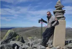  ??  ?? Jarvis atop Mount Townsend. He says he’s searching for the sake of Srawn’s family — and because “Prabh’s my brother. He’s a fellow hiker.”