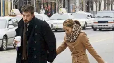  ?? Boston herald file photo ?? Ben affleck and Jennifer Lopez take a walk in Cambridge in 2003. the couple are back together.