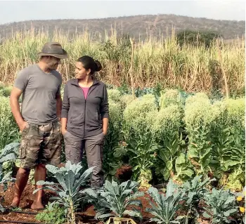  ??  ?? NEW AGE FARMERS: City-based couple, Kabir and Anjali in their farm on the outskirts of Hyderabad