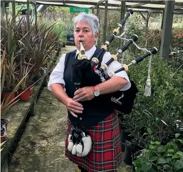  ?? STUFF ?? Piper Ann Robbie, at her workplace, Diacks Nurseries Lorneville, tuning up for Anzac Day services on Sunday.