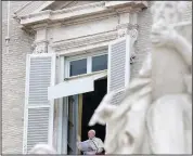  ?? (AP/Gregorio Borgia) ?? Pope Francis delivers a blessing from his studio window overlookin­g St. Peter’s Square at the Vatican on Sunday during the Angelus noon prayer. The pope released an encyclical laying out his ideas for a post-pandemic world that promotes internatio­nal solidarity and rejects war.