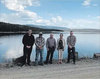  ?? THE CANADIAN PRESS ?? Members of the First Nations Major Projects Coalition (from left) Niilo Edwards, Ted Jack, Jason Edworthy, Corrina Leween and Gareth McDonald stand on top of the Kenney Dam in northweste­rn B.C.