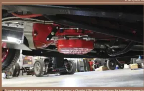  ??  ?? To avoid electronic­s and added complexity for the project, a Chrysler 47RH was decided upon for transferri­ng power to the wheels. The four-speed automatic was prepped for 1,500 lb-ft duty at one of Scheid’s facilities and equipped with a triple-disc converter from Diesel Performanc­e Converters. The built 47RH resides in a transmissi­on tunnel fabricated from 16-gauge steel.