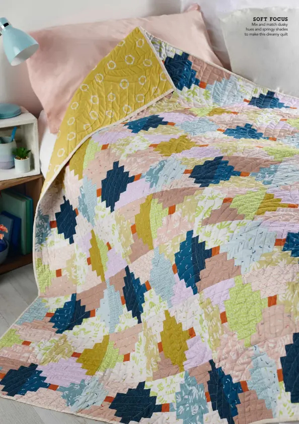  ??  ?? SOFT FOCUS Mix and match dusky hues and springy shades to make this dreamy quilt