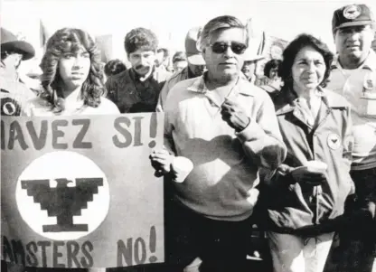  ?? United Press Internatio­nal 1984 ?? Photo at right: Carlos Santana with his mother, Josefina Barragán de Santana, who asked him to make a movie about Dolores Huerta. Above: Huerta (right) marches with Cesar Chavez in 1984.