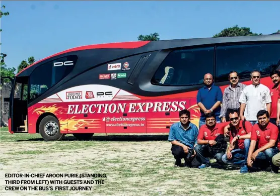  ??  ?? EDITOR-IN-CHIEFAROON PURIE (STANDING, THIRD FROM LEFT) WITH GUESTS AND THE CREWON THE BUS’S FIRSTJOURN­EY