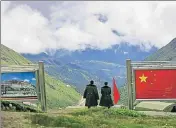 ?? AP FILE ?? Chinese army officers oversee preparatio­ns on the Chinese side of the border at Nathu La in Sikkim.