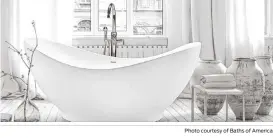  ?? Photo courtesy of Baths of America ?? The “garden tubs” popular in the 1990s are being replaced by more efficient, practical, space-saving models. Current bathtub trends include freestandi­ng tubs that require less floor space.