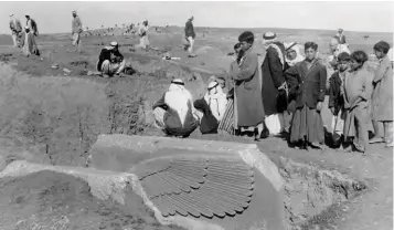  ?? — AP photos ?? This 1949 photo taken by British mystery author Agatha Christie shows a statue of a lamassu, a winged bull from Assyrian mythology who guarded the royal court from evil, at the ancient site of Nimrud, near modern day Mosul, Iraq. This undated photo...