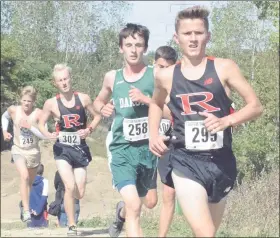  ?? GEORGE POHLY — THE MACOMB DAILY ?? Joe Rinke of Romeo tours the course at Romeo High during a MAC Red jamboree.