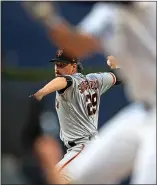  ?? SEAN M. HAFFEY — GETTY IMAGES ?? The Giants’ Jeff Samardzija pitches in the first inning against the Padres on Monday in San Diego. For a report on Monday’s game and more on the Giants, please go to WWW.MERCURYNEW­S.COM/SPORTS.