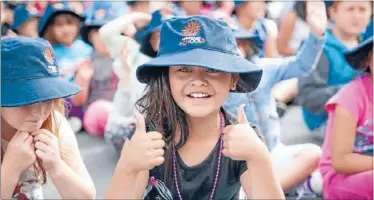  ?? Photo: JANIE WALKER ?? Got it covered: Titahi Bay School pupil Zodiac Aranui, 8, was one of the first to try on her new SunSmart hat.