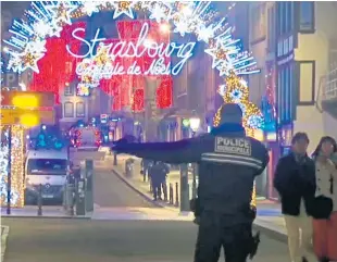  ?? Picture: AP. ?? Police at the scene of the murders in Strasbourg last night.