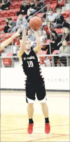  ?? Staff photograph by Mark Humphrey ?? Pea Ridge senior Carson Rhine releases a jump-shot. Rhine scored 5 points in the Blackhawks’ triple overtime 65-63 loss to Farmington on Tuesday, Dec. 18, in Cardinal Arena.