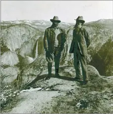  ?? LIBRARY OF CONGRESS ?? Theodore Roosevelt, left, and John Muir poses atop Glacier Point at Yosemite National Park in 1903.