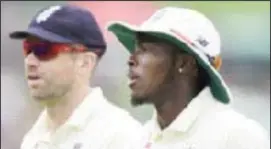  ??  ?? James Anderson (left) with teammate Jofra Archer who was the subject of racial slurs during England’s Test against New Zealand last November.