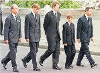  ?? JEFF J. MITCHELL, AFP/GETTY IMAGES ?? Walking behind the casket, from left, were Prince Philip, the queen’s husband; Diana’s elder son, Prince William; Charles, Earl Spencer, the princess’ brother; her younger son, Prince Harry; and Prince Charles, her former husband.