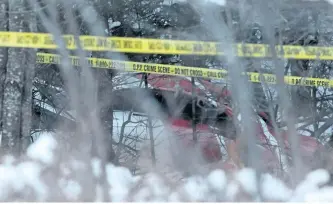  ?? LARS HAGBERG/THE CANADIAN PRESS ?? The wreckage of a Hydro One helicopter is seen Thursday near Tweed, 95 kilometres east of Peterborou­gh. Four Hydro One employees were killed Thursday in the crash around noon.