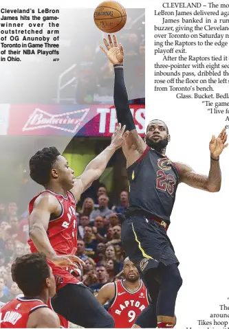  ??  ?? Cleveland’s LeBron James hits the gamewinner over the outstretch­ed arm of OG Anunoby of Toronto in Game Three of their NBA Playoffs in Ohio.