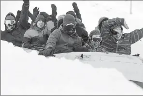  ?? St. Louis Post-Dispatch/TNS/BRIAN SIRIMATURO­S ?? Winter Park, just outside Quebec City, lures scores of adventure seekers with its many tubing runs through the deep snow.