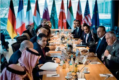  ?? AFP ?? UAE Foreign Minister Sheikh Abdullah bin Zayed Al Nahyan listens to German Foreign Minister Sigmar Gabriel speaking during a meeting on Syria in Bonn, Germany, on Friday. US Secretary of State Rex Tillerson, Turkish Foreign Minister Mevlut Cavusoglu...