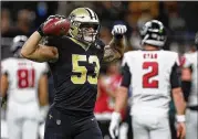  ?? CHRIS GRAYTHEN / GETTY IMAGES ?? Saints linebacker A.J. Klein celebrates his intercepti­on of Falcons QB Matt Ryan on Thursday in New Orleans. It was one of four Falcons turnovers.