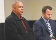  ?? Brian A. Pounds / Hearst Connecticu­t Media ?? Norwalk Police Officer Hector Delgado, left, 46, of Stratford, appears with his lawyer, Noah Kores, in state Superior Court in Bridgeport on Tuesday.