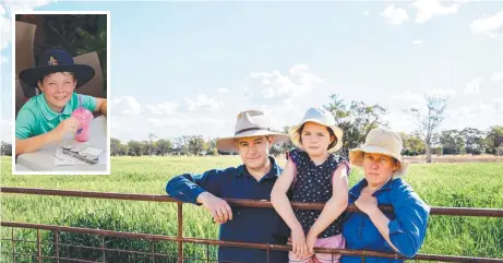  ?? Picture: Laura Kennedy ?? FAR FROM HOME: James Maunder and Justine McNally, with their daughter Emma, 9, on their property just outside Moree. Their 11year-old son Henry (inset), is a boarder in Toowoomba and is stuck there due to border restrictio­ns, meaning he can't come home for the school holidays.
