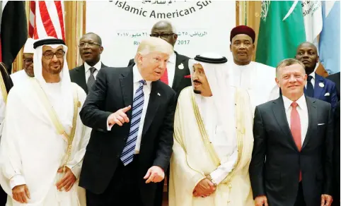  ??  ?? King Salman, US President Donald Trump and leaders of Arab and Islamic countries at the Arab-Islamic-American Summit in Riyadh on Sunday. (Reuters)