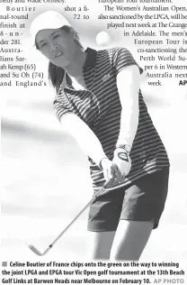  ?? AP PHOTO ?? Celine Boutier of France chips onto the green on the way to winning the joint LPGA and EPGA tour Vic Open golf tournament at the 13th Beach Golf Links at Barwon Heads near Melbourne on February 10.