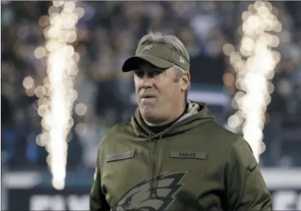  ?? MATT SLOCUM — THE ASSOCIATED PRESS ?? Philadelph­ia Eagles’ head coach Doug Pederson takes the field prior to Sunday night’s game against the Dallas Cowboys in Philadelph­ia. The Eagles lost 27-20 and are now 4-5 on the season.