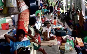  ?? ALEX BALUYUT/CONTRIBUTO­R ?? MANOBO infants are most at risk in the evacuation center at the Tandag City gymnasium in Surigao del Sur province.