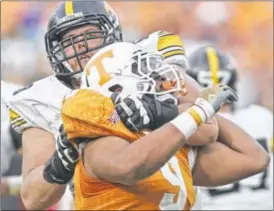 ?? PHIL SEARS / USA TODAY SPORTS ?? Iowa’s Brandon Scherff could be among the offensive tackles still available in a deep class of linemen when the Bengals are on the clock with the No. 21 pick. Despite its talent at the position, the team needs to bolster an aging line.