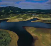  ?? JUSTIN SULLIVAN — GETTY IMAGES ?? In an aerial view, low water levels are visible at Marin County’s Nicasio Reservoir on Friday.