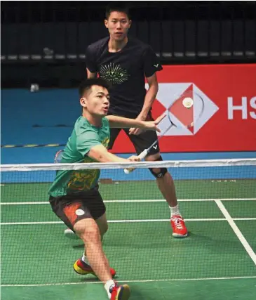  ??  ?? Never stop trying: Doubles shuttlers Goh V Shem (back) and Tan Wee Kiong will kick off their campaign in the Malaysian Masters against China’s Huang Kaixiang-Wang Zekang.