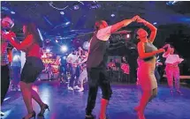  ?? Picture: AP ?? Couples dance at a club in Damascus, Syria, June 13, 2022. For the participan­ts, ballroom dancing is a form of release, finding their rhythm in music away from their country’s many social and economic pressures.