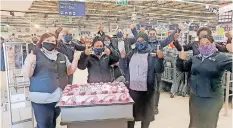  ?? | Facebook ?? PICK n Pay staff celebrate the reopening of their shop.