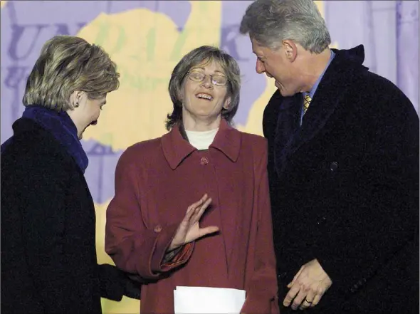  ??  ?? d“on’t have the speech anymore, but I know the tone of it was very much on how Dundalk was emerging out of the dark days.
LEFT: First Lady Hilary Clinton shares a joke with Joan McGuinness, Dundalk businesswo­man and the President Bill Clinton.
BELOW: Joan takes to the podium to introduce the President of the USA to the people of Dundalk.