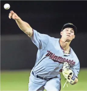  ?? DARRYL WEBB/THE ARIZONA REPUBLIC ?? Twins pitching prospect Griffin Jax also is a lieutenant in the U.S. Air Force.