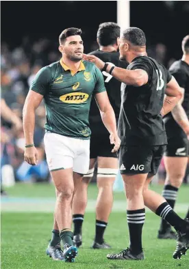  ?? Picture / Photosport ?? Damian de Allende gets a consoling pat on the back from Ofa Tu’ungafasi after the Springbok’s controvers­ial red card yesterday.