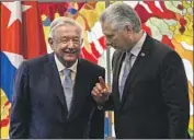  ?? Yamil Lage Pool Photo ?? MEXICAN President Andrés Manuel López Obrador, left, with Cuban President Miguel Diaz-Canel.